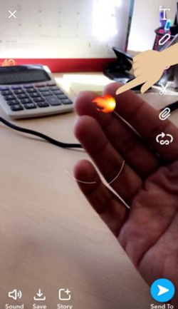 how to add moving emoji to video on snapchat